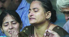 Rajni, grieving wife of Mridul Bakshi, who succumbed to blast injuries at RML Hospital on Thursday