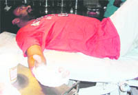Tulsi Dass, one of the injured teachers, undergoing treatment at the Civil Hospital in Jagraon.