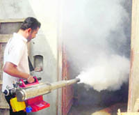 The Health Department team carries out a fogging drive at Chailaila village, 15 kms from Patiala, where three persons died due to malaria in the last 10 days.
