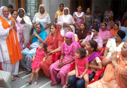 Mukhtiar Kaur (left), wife of senior SAD leader Jathedar Tota Singh during a door-to-door campaign at Moga