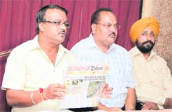 State BJP secretary Ravi Mahendru along with BJP councillors addresses the media in Jalandhar on Friday. 