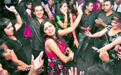 Students dance during a fresher’s party organised at PIFT in Ludhiana, on Friday