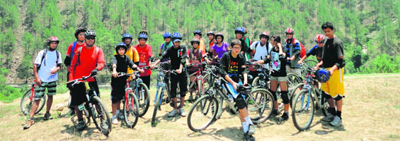 Adventure lovers at a camp for biking enthusiasts in the Himalayas