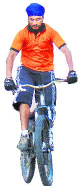 Jeevanjit Singh of Chandigarh helps to prepare mountain bikes