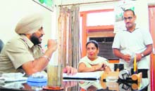 The victim Neelam Kumari and her son Sumit Kumar at the Rambagh police station in Amritsar 