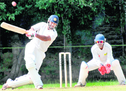 Irfan Pathan plays a shot during JP Atray Cricket Tournament held at St Johns High School in Sector 26, Chandigarh, on Saturday