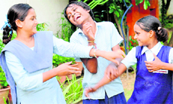 Govind (centre), a former child beggar who ran away from Snehalya in October 2010, with Krishna (left) and Ashima (right), former inmates of Snehalya, who opted out due to alleged regular beating and abuses, are back to a happy childhood at Vatsal Chhaya, Sector 7
