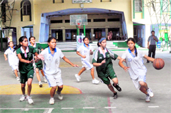 A match under way between DAV Public School (in white) and St Thomas School ( in green) in the Gardner Silver Jubilee Inter-school Basketball Tournament for Girls in Dehradun on Saturday