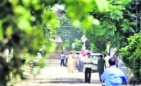 Securitymen stand guard outside the house of ailing Thananter Kaur, sister of PM’s wife Gursharan Kaur, in Sargodha Colony, Ludhiana, on Saturday