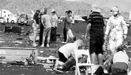 People help victims after a vintage World War-II fighter plane crashed into the grandstand at the Reno Air Races in Nevada on Friday.