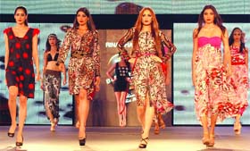 HAUTE COUTURE: Models present creations of designer Rina Dhaka at the 7th session of Seagram's Blenders Pride Fashion Tour in New Delhi on Saturday night