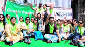 Members of the Citizens for Green Doon hold a protest against the administration in Dehradun on Sunday.