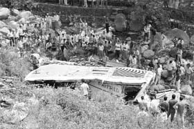 The remains of a Pakistan Navy bus after it was attacked by terrorists in Karachi in April 2011