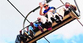 Chief Minister Omar Abdullah waves from a ropeway at Kongdori in Gulmarg on Sunday.