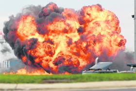 A single engine T-28 crashes and explodes during a performance at the Thunder Over the Blue Ridge Open House and Air Show at the 167th Airlift Wing in Martinsburg on Saturday