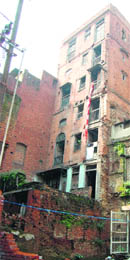 An unsafe buillding near Dharam Singh Market in the walled city