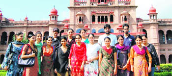 Students from the Kashmir Valley pose for a photograph in front of Khalsa College
