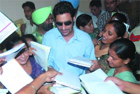 Fans seek autograph of Punjabi singer and cine star Harbhajan Mann while he was in Bathinda on Monday to promote his forthcoming film Yara O Dildara