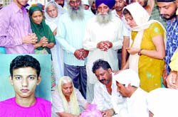 Relatives of Gagandeep who died in a road accident at Khajuri Khas in East Delhi on Monday. 