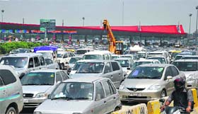 Vehicles stuck in a traffic jam at the Toll Plaza in Gurgaon. 