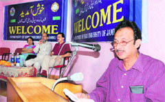 A speaker addresses the gathering during a seminar at the University of Jammu 