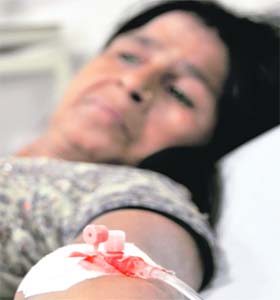 Kuldeep, an employee of Laxmi Mill, being treated at the CMCH in Ludhiana