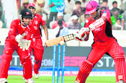 Ruhunas Chandimal (R) in action on Monday. 