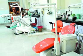 A patient undergoes treatment at the dental wing in Civil Hospital at Bathinda