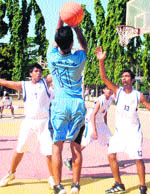 Players in action during a basketball match of the Indian Public School Conference Sports Tournament at Mohali 