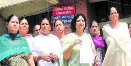 Members of the Mahila Congress submit a memorandum in Jalandhar on Tuesday.