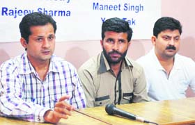 Leaders of the Jammu and Kashmir Agricultural Technocrats Association address mediapersons in Jammu on Tuesday