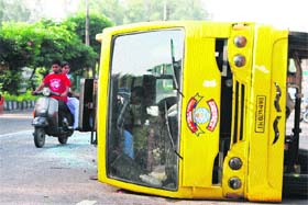 A school bus that overturned in Jammu on Tuesday. Nobody was injured in the accident