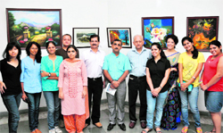 Artists whose works are on a display at Kala Kendra in Jammu