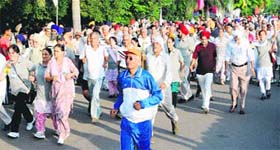Senior citizens are all smiles while enjoying the ‘Walk for Fun’ organised by the Chandigarh Police at the Sukhna lake in Chandigarh on Wednesday morning