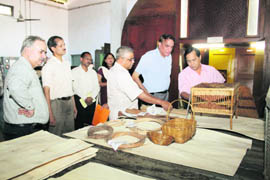 Jitendra Chaudhary, Minister for Rural Development,Tripura (extreme right), has a look at bamboo items manufactured at the Forest Research Institute, Dehradun