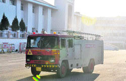 A fire engine comes out after dousing the flames at the Civil Secretariat building in Jammu
