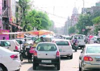 A view of the busy market at Ghumar Mandi which has many illegal constructions.