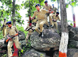 Policemen from Naxal-affected districts of Jharkhand participate in an intensive training in jungle warfare to combat Naxal menace in their areas
