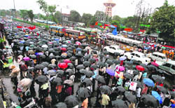Left Front activists take part in a rally to protest against price hike in Kolkata 