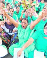 Members of the ANM and LHV Union Punjab at a protest in support of their demands in Patiala on Wednesday. 