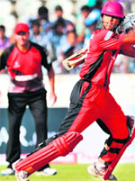 Ruhunu XIs Dinesh Chandimal plays a shot during their match against Leicestershire in Hyderabad