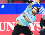 Kashyap Parupalli of India returns a shot to Viktor Axelsen of Denmark at the Japan Open badminton championships in Tokyo