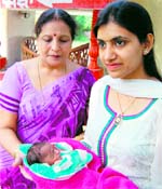 Ritu Agarwal holding the 47th baby left in the Pangura at the Red Cross Bhavan in Amritsar on Thursday.