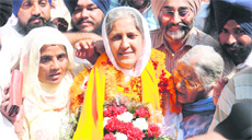Former Mayor Harjinder Kaur comes out of the Deputy Commissioners office after her win in the SGPC elections in Chandigarh on Thursday. 