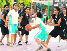 A basketball match in progress during the All-India IPSC Tournament in Mohali on Thursday. 