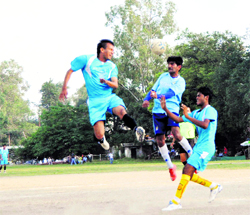 A match under way in the Doon Callisto Cup tournament in Dehradun on Thursday