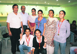 The winning team with Dr Bhandari, deputy director, Sports Department, Kurukshetra University, and Dr Vibha Gupta, Head, Sports Department of DAV College for Girls, at Yamunanagar.