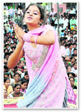 A student performs during a talent search programme at Government PG College in Karnal. 
