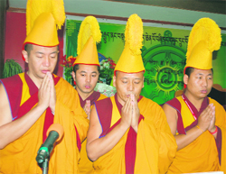 Monks pray before the start of a three-day meeting of Tibetan religious heads at McLeodganj in Dharamsala on Thursday
