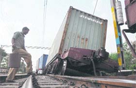 Derailed bogies of a goods train block an adjoining track at Dhandari railway station near Ludhiana on Thursday